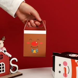 Christmas reindeer gift box with handle, festive apple packaging on red background