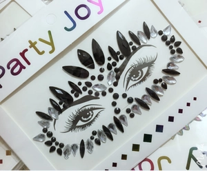 Detailed view of Party Joy face gems with black and silver rhinestones for eye makeup