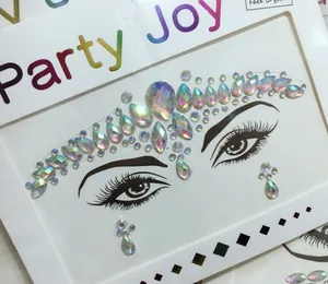 Macro detail of iridescent face crystal jewels in assorted shapes with AB fire luster