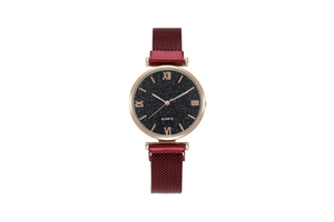 Detailed macro view of starry sky dial with rose gold Roman numerals and mesh strap