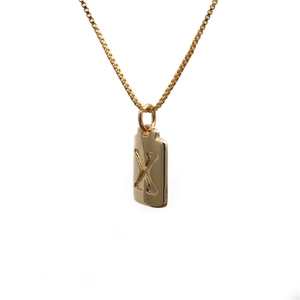 Golden pendant necklace with engraved letter X on a rectangular plate and thin chain