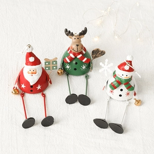 Hanging metal Christmas ornaments featuring Santa, snowman and reindeer with long legs