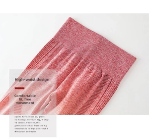 Detail of red heathered high-waisted seamless leggings with supportive ribbed knit texture