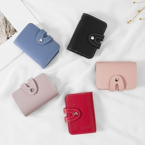 Large capacity leather card holder in five colors with button closure and 26 card slots
