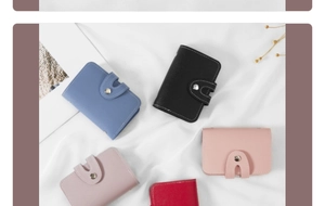 Macro shot of compact PU leather card holders in various colors with metal snap buttons