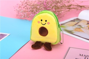 Close-up of plush avocado coin purse with green zipper and silver bead chain on pastel background