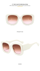 Detail view of square beige sunglasses with brown-to-pink gradient lenses and thick temples