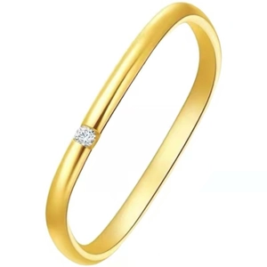 Close-up of minimalist gold plated bangle featuring a single embedded round zircon crystal