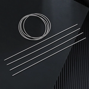 Detailed macro view of 1.7mm stainless steel wire ring DIY components on black background