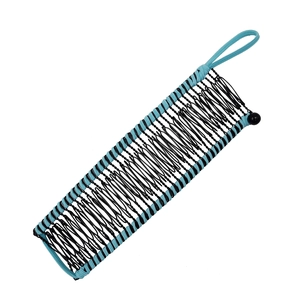 Detail of light blue elastic banana hair clip with black interlocking combs on white background