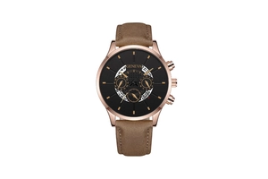 Detail of rose gold case and brown leather strap on a business quartz wristwatch