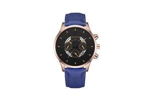 Detail of blue matte leather strap and rose gold quartz watch case with black dial