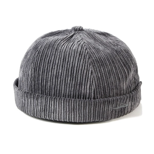 Gray corduroy docker hat with vintage texture and minimalist design on white background