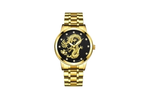 Detail of gold watch face featuring a gold dragon relief and diamond hour markers