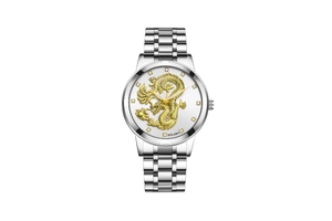 Detail of silver steel watch with white dial featuring a golden embossed dragon and crystals