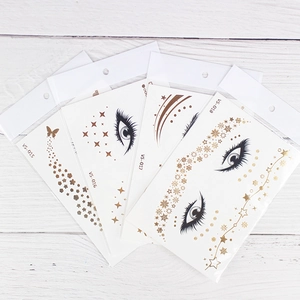 Golden freckle and star face tattoo stickers set for rave and festival party makeup
