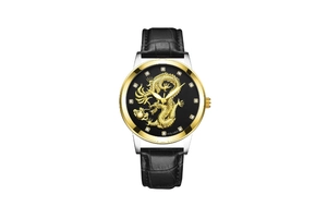 Detailed close-up of golden dragon relief and crystal indices on a black watch dial