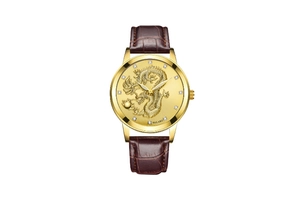 Detailed macro shot of a gold dragon relief dial and crystal indices on a leather watch