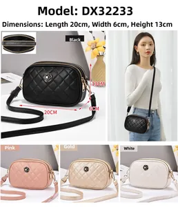 Quilted crossbody bag featuring camellia metal lock and dual zipper compartments