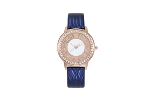 Close-up of rose gold watch case with crystal bezel and dark blue leather strap