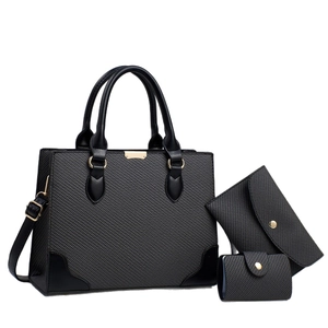Three-piece dark grey textured leather handbag set with tote bag, wallet, and card holder