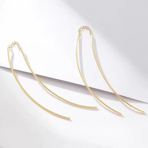 Elegant gold S925 sterling silver long tassel earrings with minimalist curved lines