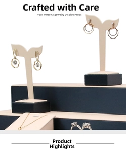 Navy blue brushed PU leather jewelry display set with tiered stands for rings and necklaces