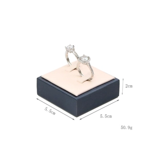 Blue and pink jewelry display box with silver rings and product dimensions