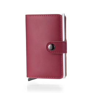 Detailed view of burgundy PU leather and aluminum card holder with metal snap closure