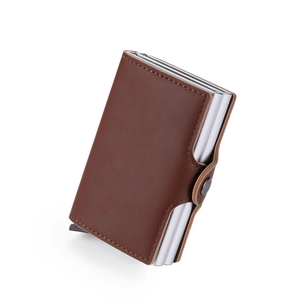Detail of brown leather card holder with aluminum pop-up slot and snap button closure