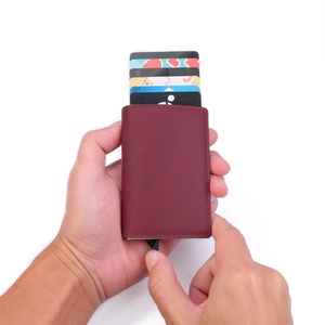 Burgundy RFID leather card holder with automatic pop-up mechanism for credit cards