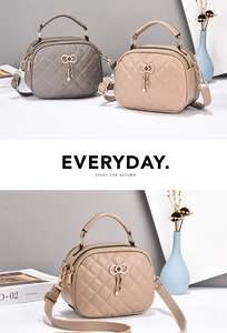 Detailed view of quilted tote bags with metal bow charms and dual zipper closures