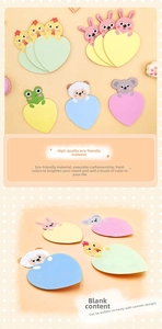Macro detail of cartoon animal sticky notes featuring heart-shaped writing area in pastel colors