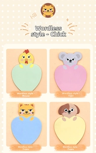 Macro view of four colorful heart-shaped sticky notes with cute cartoon animal heads