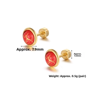 Detailed view of 7.9mm gold screw back studs with vintage red cracked pattern texture