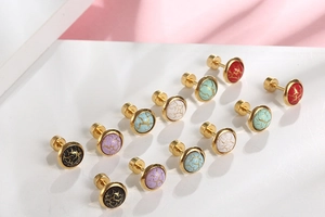 Close-up of vintage round crackle pattern stud earrings in multiple colors for men and women