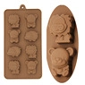 Detail of a brown silicone mold featuring cartoon lion and bear shapes on white background