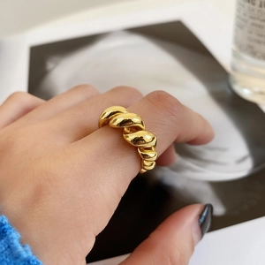 Polished 925 sterling silver twisted rope ring for women in a vintage golden finish