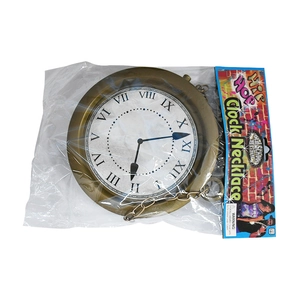 Detail of Hip Hop clock necklace in bronze finish inside clear plastic packaging