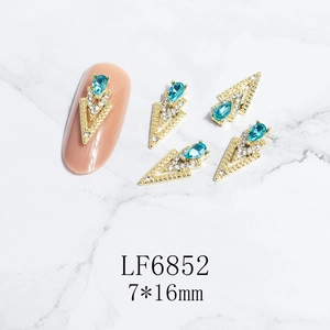 3D triangular nail art jewelry with blue teardrop gemstone and white rhinestones 7x16mm