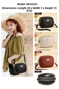 Detail view of V-quilted women crossbody bag with metal bee logo and dual zipper compartments