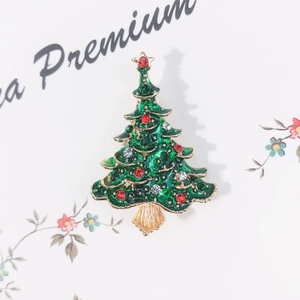Golden Christmas tree brooch with green enamel and colorful rhinestones for holiday gifts