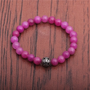 Detailed top view of rose red agate bead bracelet with vintage silver cross metal charm
