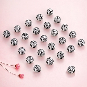 Full set of 26 S925 sterling silver alphabet beads with vintage forest pattern