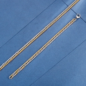Two-tone silver and gold stainless steel curb chain necklace with secure lobster clasp