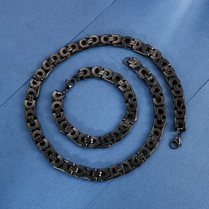 Detail of black titanium Byzantine chain necklace and bracelet set with lobster clasp