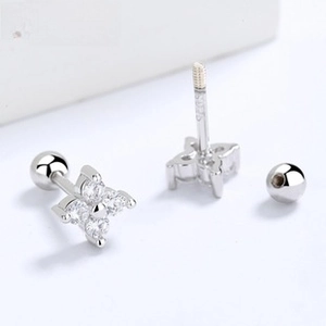 Macro shot of S925 sterling silver flower stud earrings with zirconia and screw back