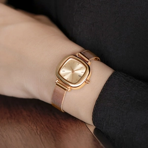Elegant gold square watch for women with minimalist dial and metallic mesh strap