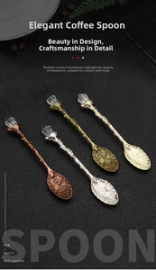 Detailed close-up of vintage alloy coffee spoons with floral leaf design and crystal tops