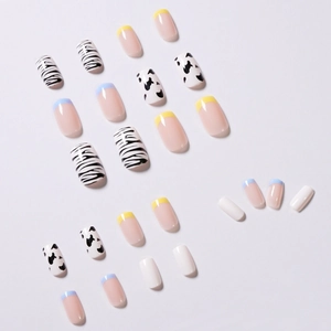 Cow and zebra print press-on nails set with blue and yellow French tips design